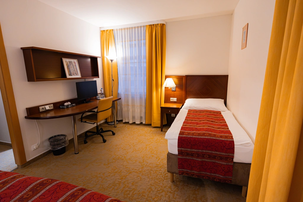 Třílůžkový pokoj kategorie Komfort - fotografie 3